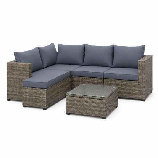 Set divano da giardino angolare 4 pezzi grigio in polyrattan con cuscini e tavolino 210 x 140 x 60 cm